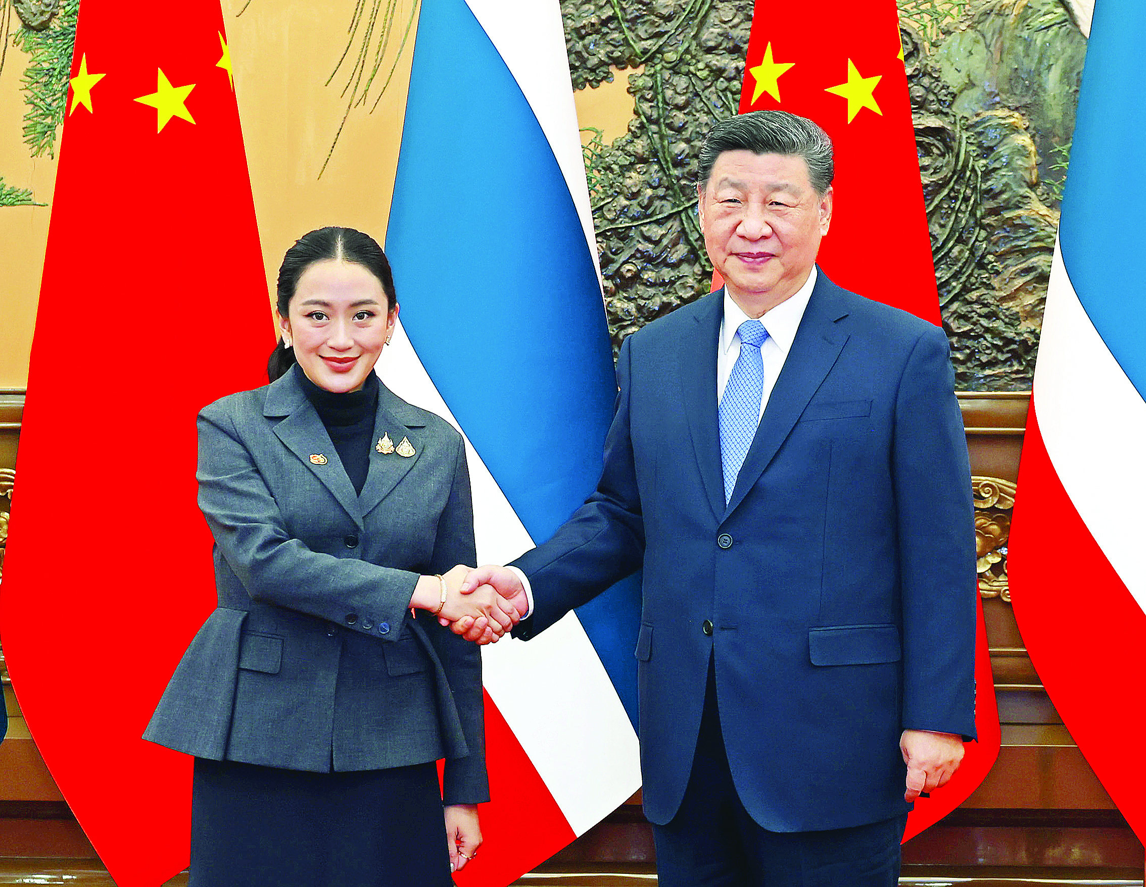     2月6日上午，国家主席习近平在北京人民大会堂会见来华进行正式访问的泰国总理佩通坦。新华社发