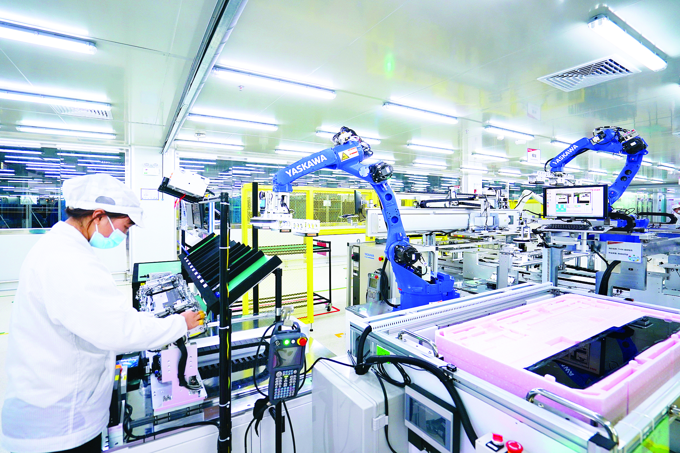     惠州华阳通用电子有限公司自动化生产线。惠州东江图片社供图