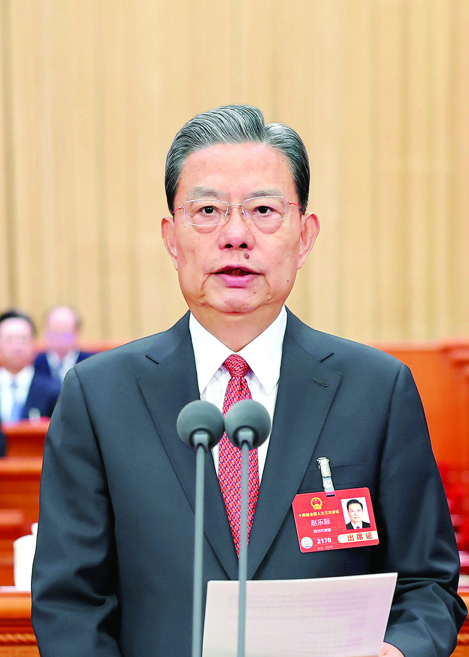     3月5日，第十四届全国人民代表大会第三次会议在北京人民大会堂开幕。赵乐际主持开幕会。新华社发