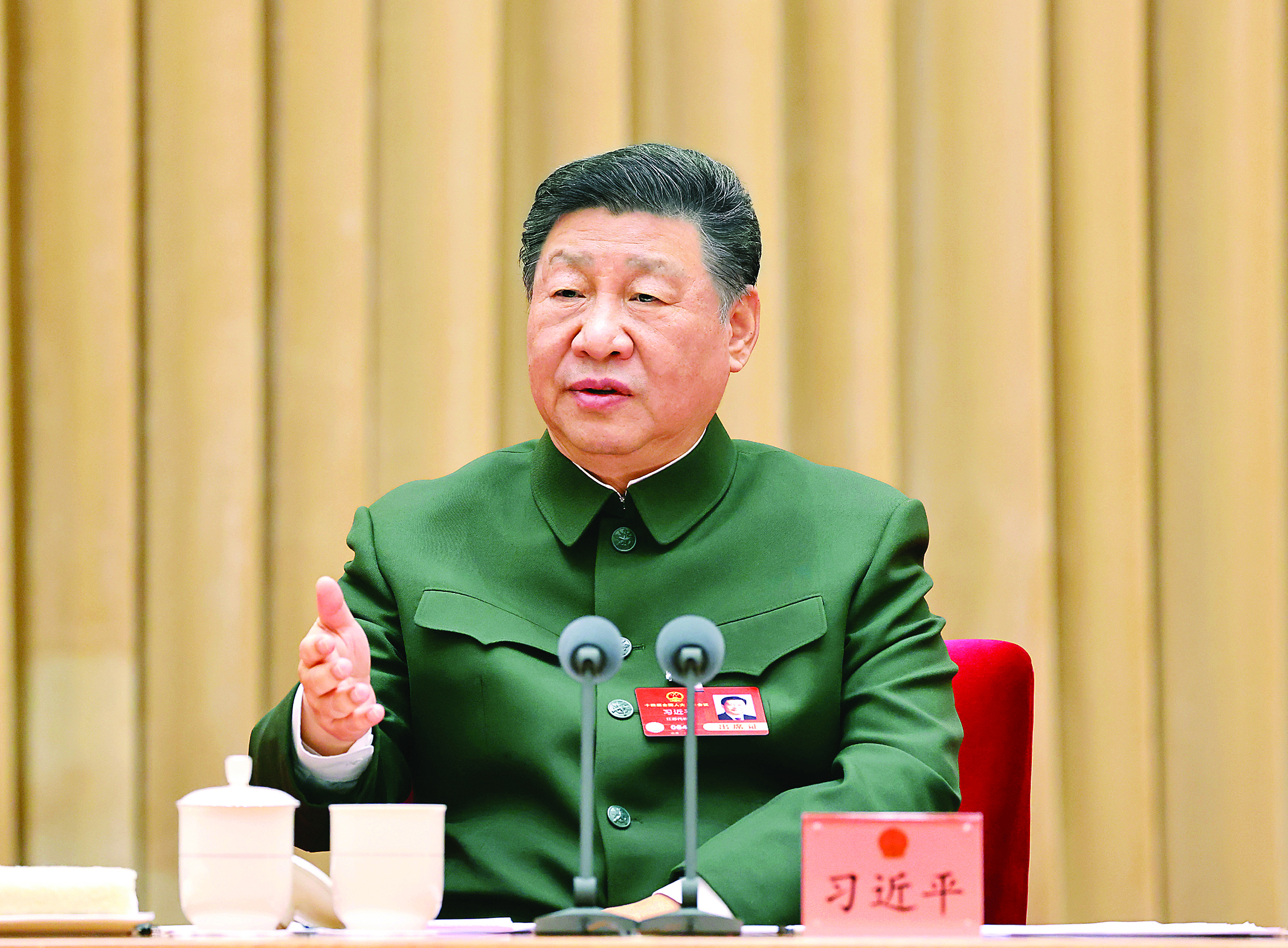     3月7日下午，中共中央总书记、国家主席、中央军委主席习近平出席十四届全国人大三次会议解放军和武警部队代表团全体会议并发表重要讲话。新华社发