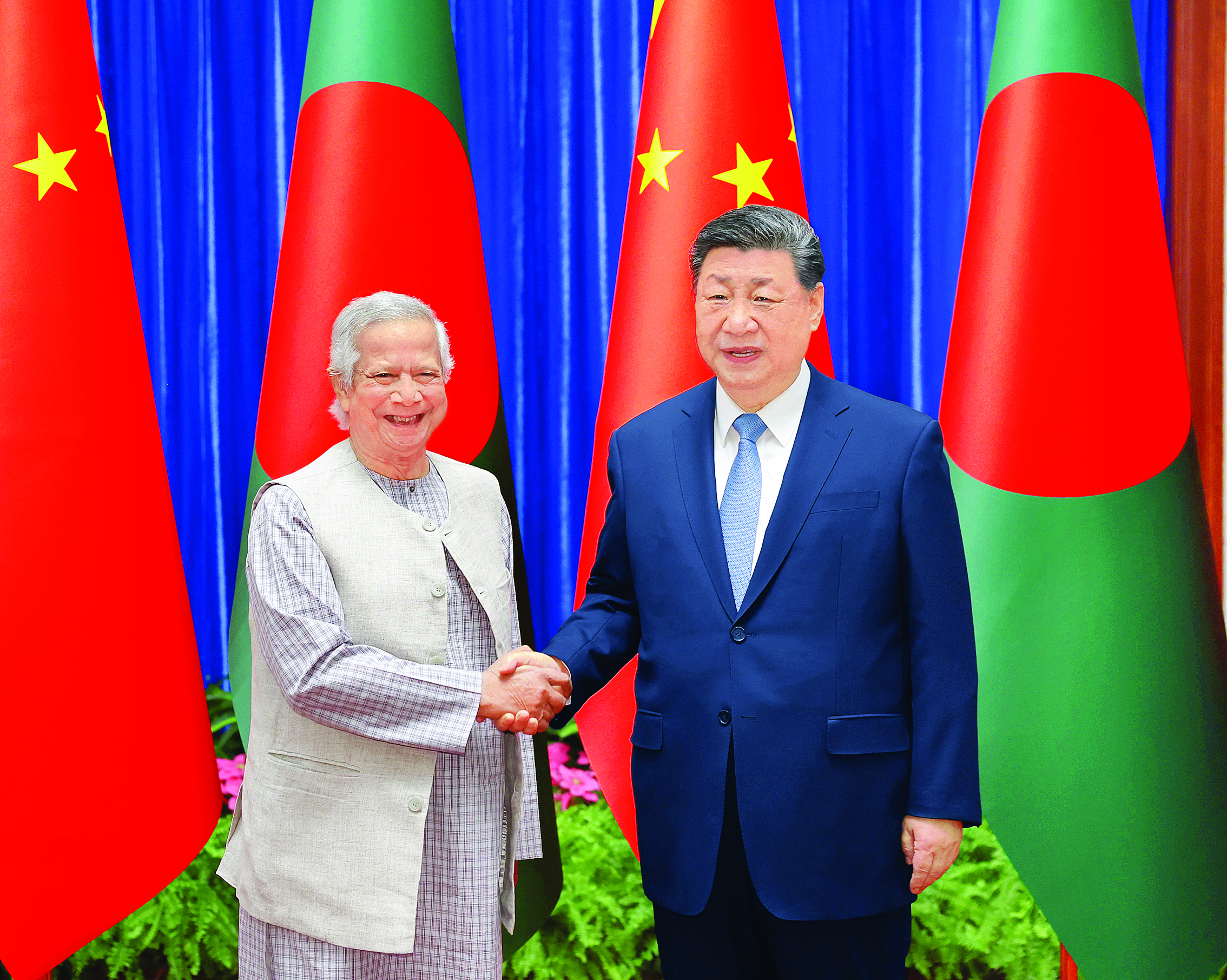     3月28日上午，国家主席习近平在北京人民大会堂会见孟加拉国临时政府首席顾问尤努斯。新华社发