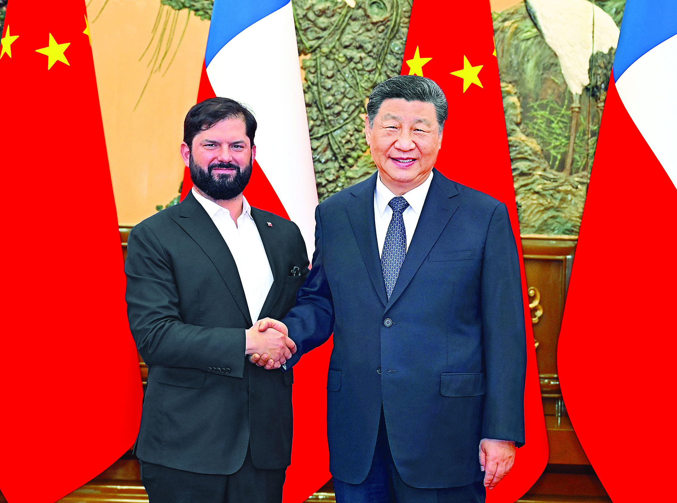     5月14日上午，国家主席习近平在北京人民大会堂会见来华出席中拉论坛第四届部长级会议的智利总统博里奇。    新华社发