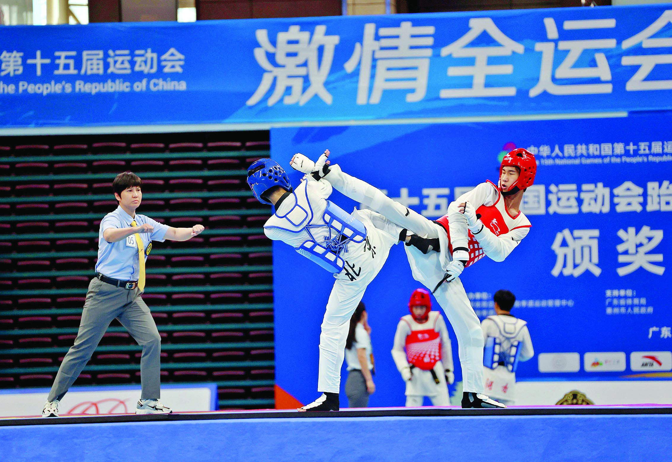     跆拳道资格赛比赛现场。惠州日报记者李松权 摄