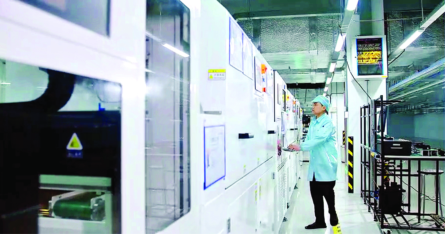     龙旗电子（惠州）有限公司生产车间。惠州日报记者张艺明 摄