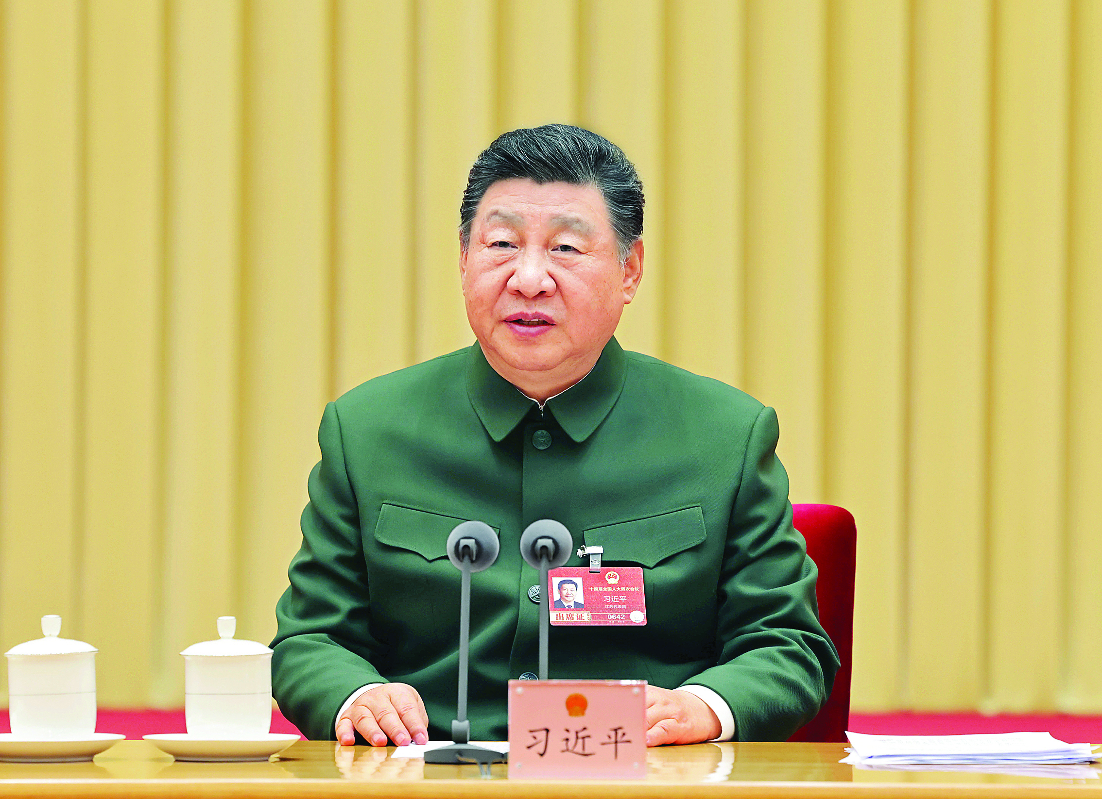     3月7日下午，中共中央总书记、国家主席、中央军委主席习近平出席十四届全国人大四次会议解放军和武警部队代表团全体会议并发表重要讲话。新华社发