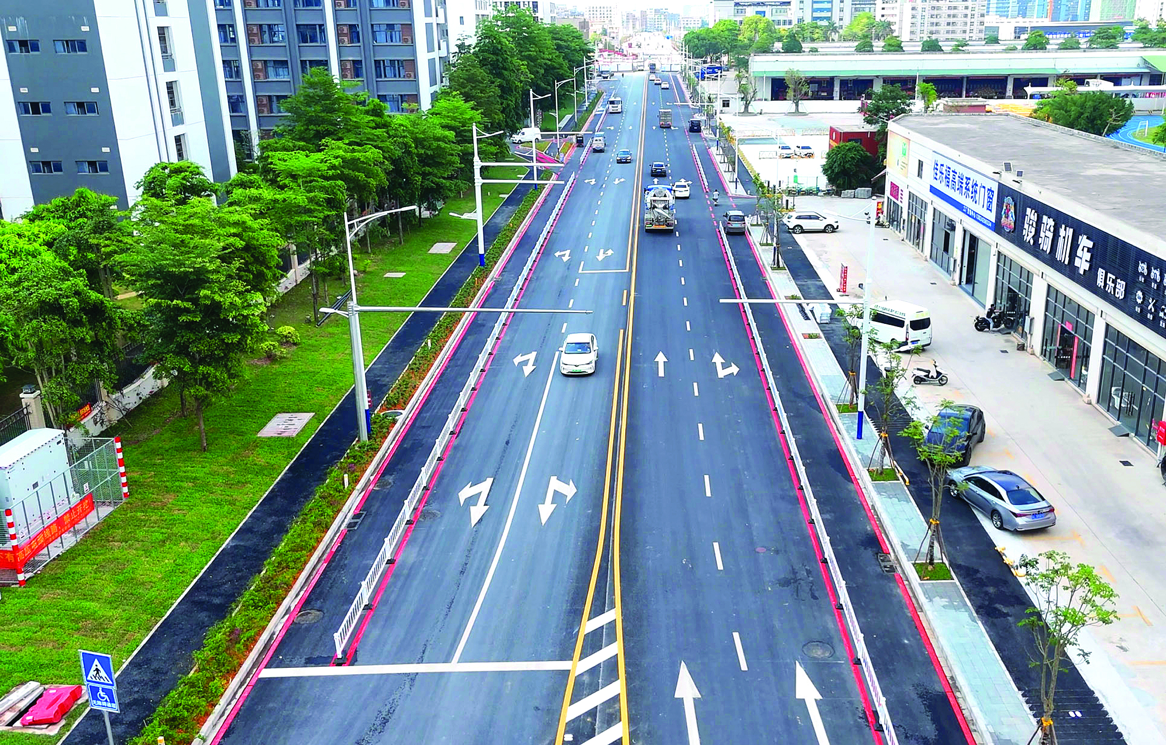     丰泽路改造后路面扩宽至双向四车道。通讯员熊丽琼供图