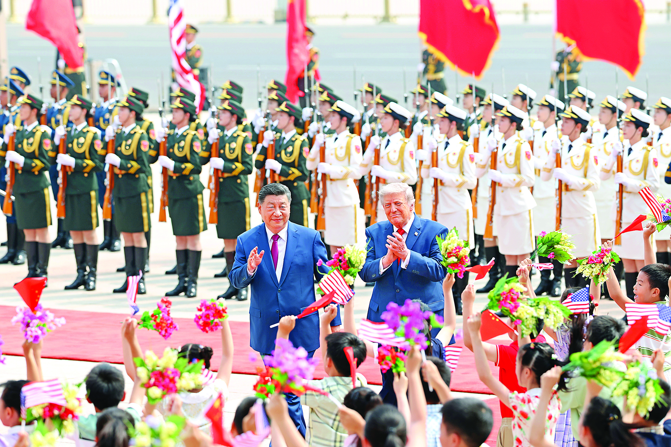     5月14日上午，国家主席习近平在北京人民大会堂同来华进行国事访问的美国总统特朗普举行会谈。会谈前，习近平在人民大会堂东门外广场为特朗普举行欢迎仪式。新华社发